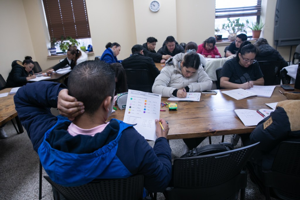 Students practice learning the names of colors at an English as a Second Language class in Sunset Park, Brooklyn.