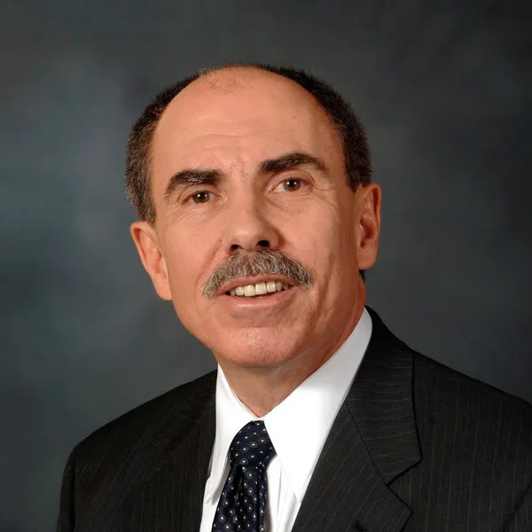 A headshot of a person.