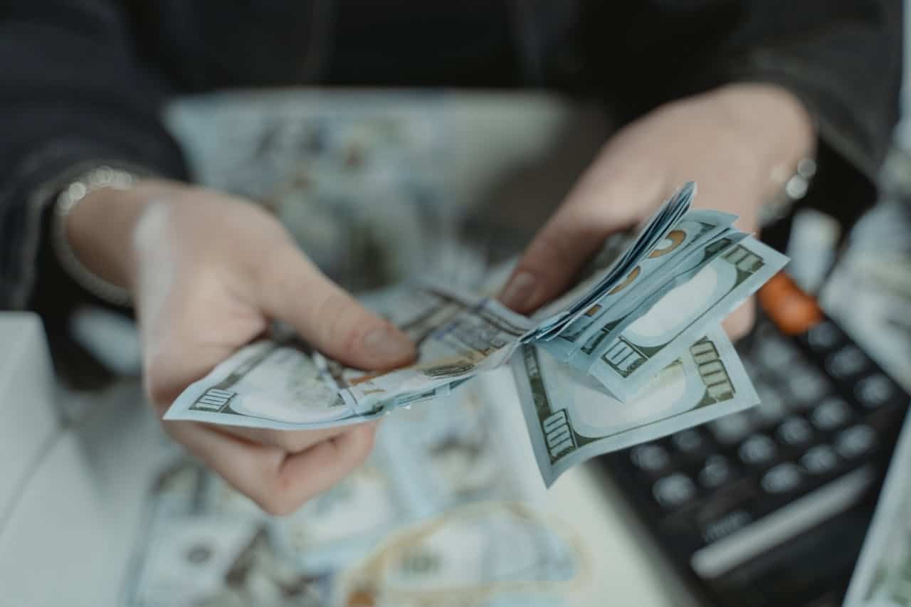 Counting money.