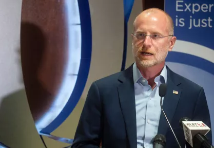 Commissioner of Federal Communications Commission Brendan Carr discusses how FCC funding has helped expand patient care at the University of Mississippi Medical Center's Center for Telehealth, during a news conference at the telehealth center in Ridgeland, Mississippi, on April 1, 2021.