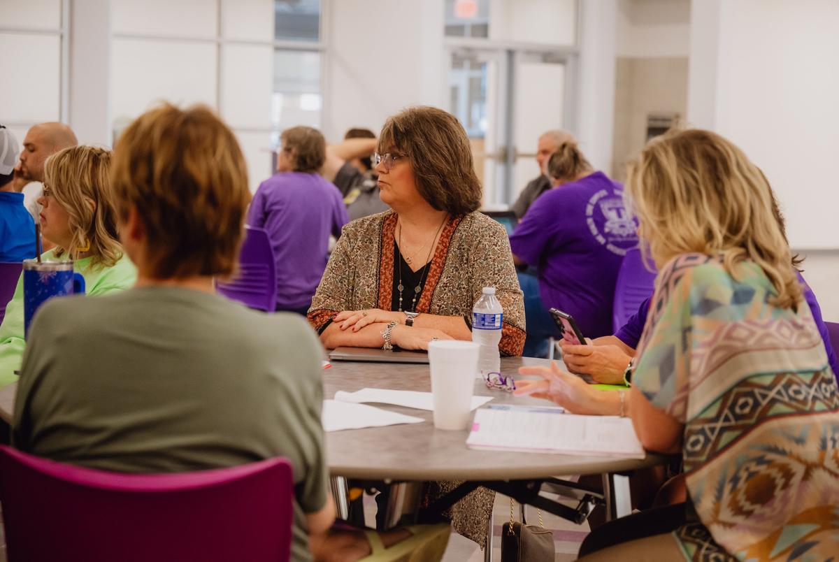 THROCKMORTON, TEXAS — JULY 29, 2025: Gay Hibbitts, 57, educator, center, participates in a safety training at Throckmorton Collegiate ISD in Throckmorton, Texas, on Tuesday, July 29, 2025. Ms. Hibbitts was part of a federally funded educator preparation program serving about 30 participants across 11 rural Texas districts. The funding, which covered two years of college and training costs, was cut on April 25 under the Trump and Elon Musk DOGE initiative, leaving her uncertain about her future. She is pursuing a bachelor’s degree in general studies with an emphasis in education and a minor in psychology at West Texas A&M. CREDIT: Desiree Rios for The Texas Tribune
