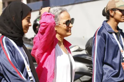 Arundhati Roy waliking on village the road at Dwaraka, Kerala, Indi