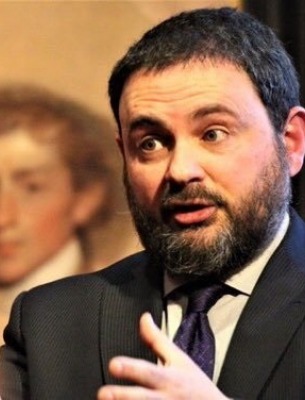 Dr. Ben Railton during a talk or lecture