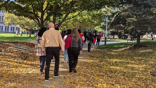 Founder’s students walking a path on campus