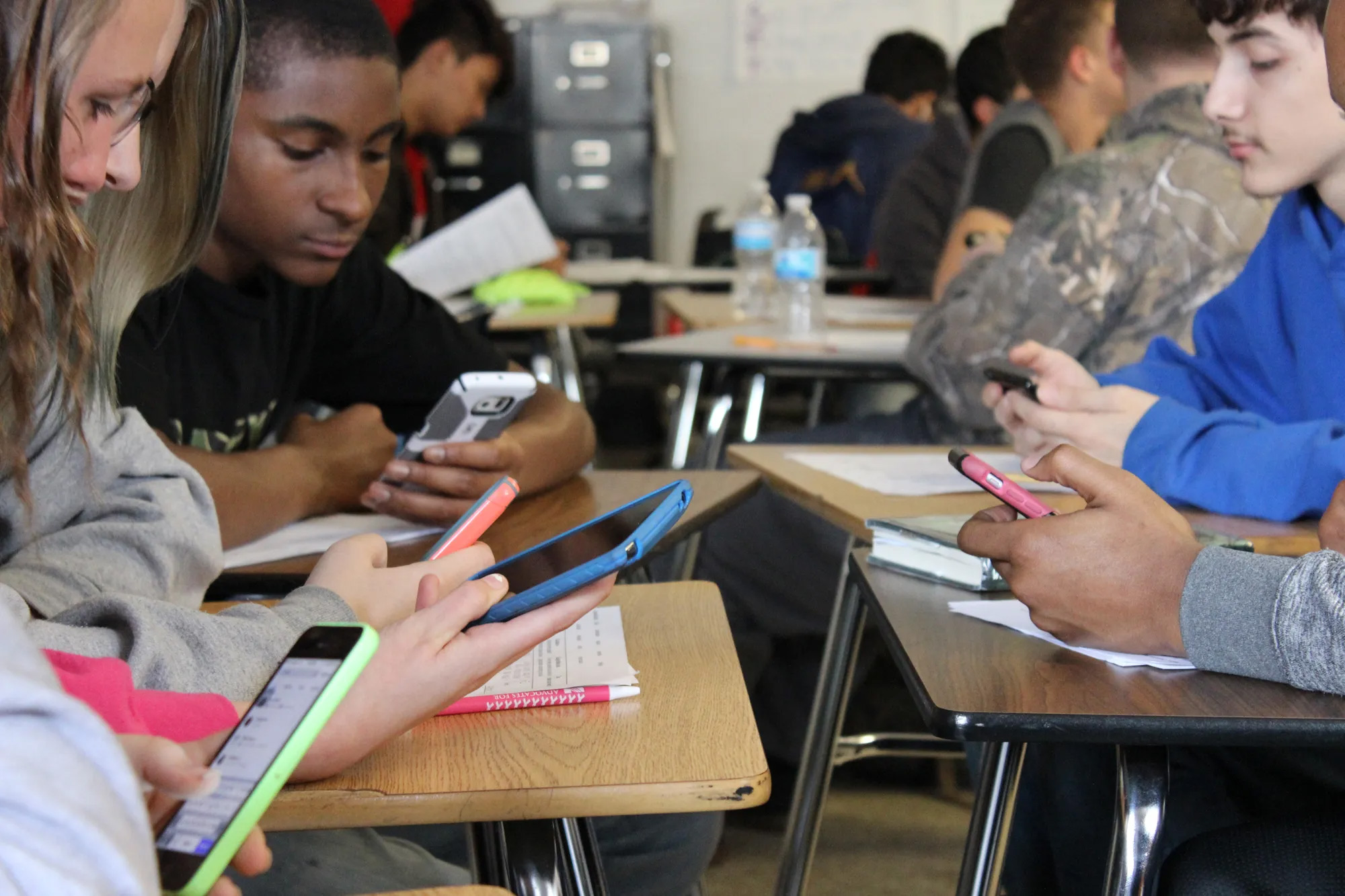 Cellphone bans can help kids learn — but Black students are suspended more as schools make the shift