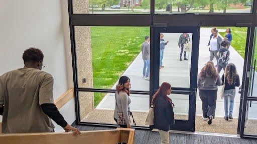 Founder’s students walking down steps