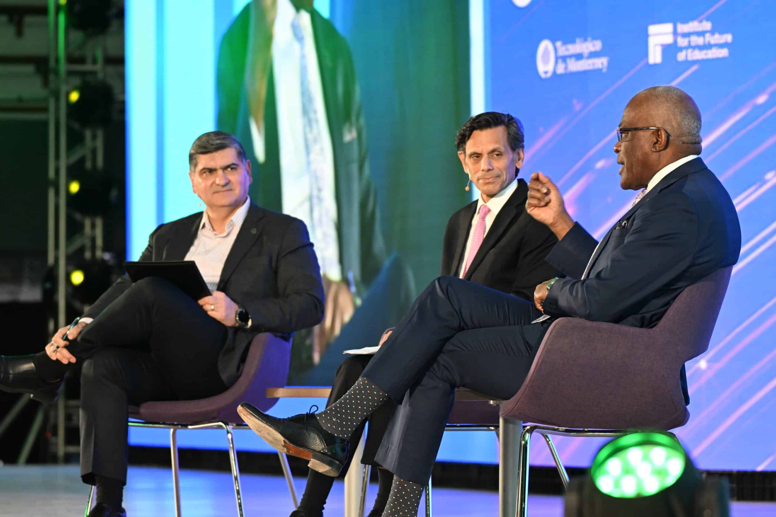 Three speakers on stage at IFE Conference 2026, Monterrey, Mexico.